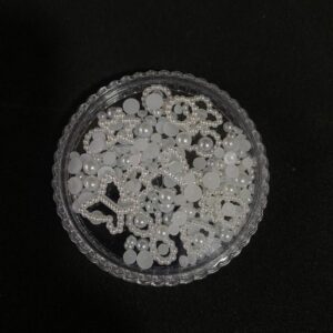 PERLAS CAJA REDONDA VARIAS DIJES